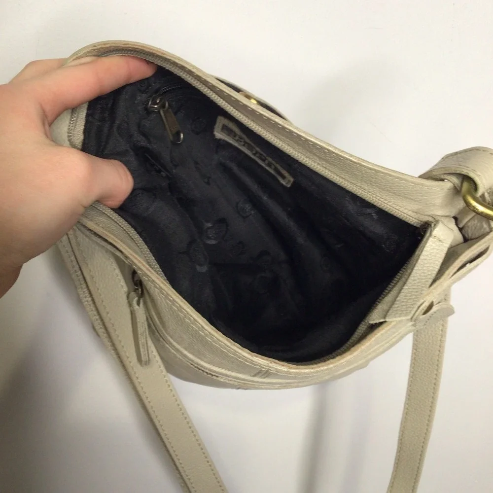 Born tan‎ leather crossbody bag